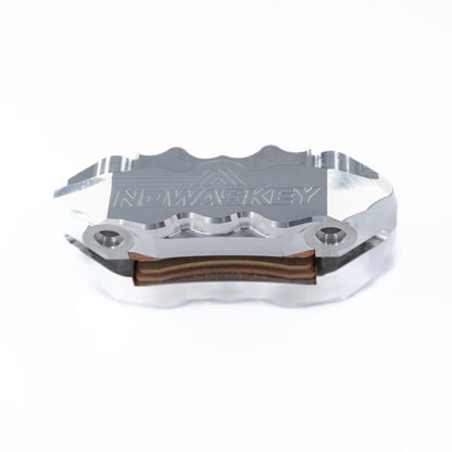 Machined Nowaskey 6 Piston Caliper Front View
