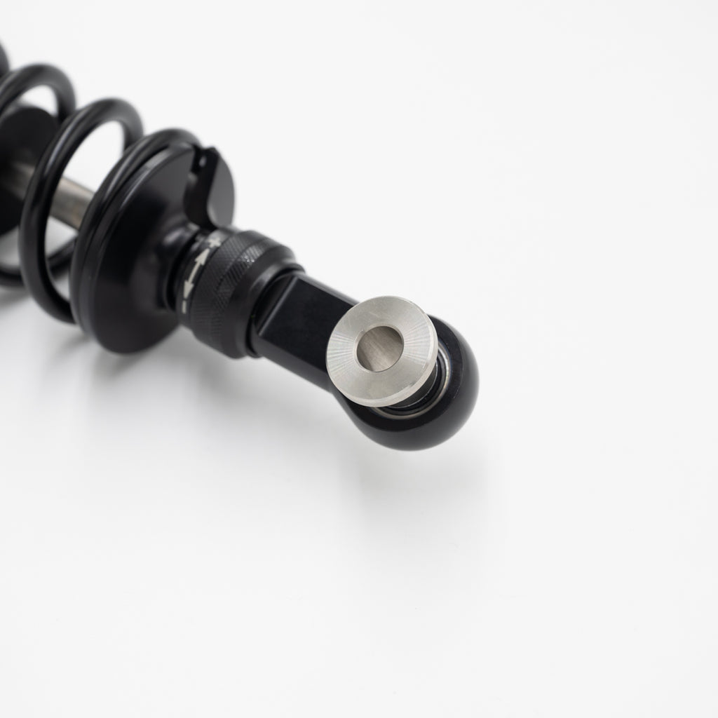 Bottom mount of Nightster shock.
