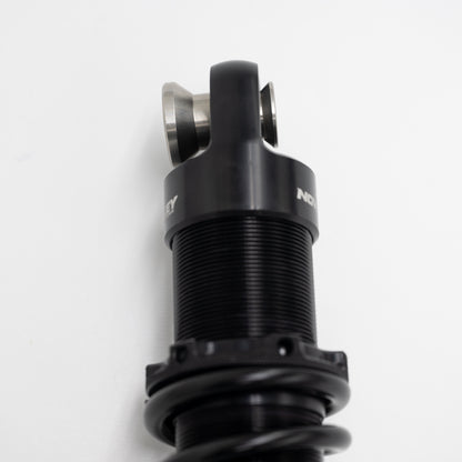 Close up of top mount of Nightster shock.