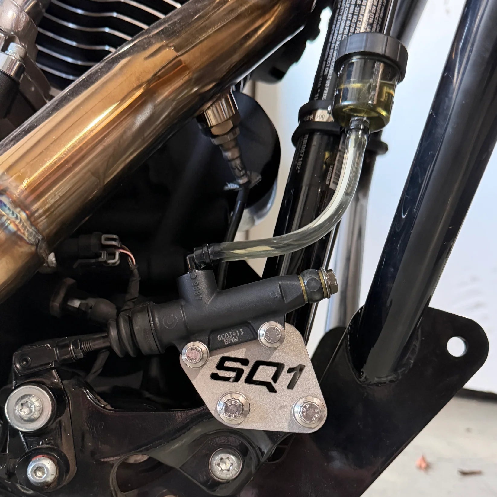 Square One Rear Brake Fix for M8 Softail Models with Mid Controls